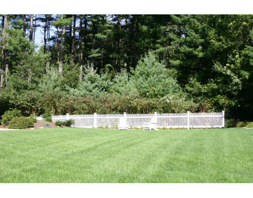 28 Moore Road Sudbury, MA 01776 - Photo 21 of 21 a view of a backyard with a garden