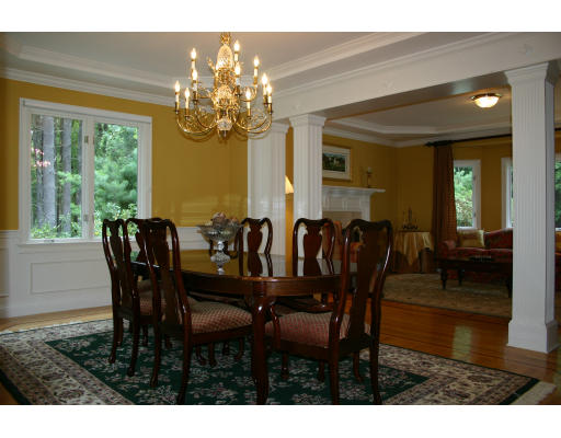 28 Moore Road Sudbury, MA 01776 - Photo 6 of 21 a view of a dining room with furniture and chandelier