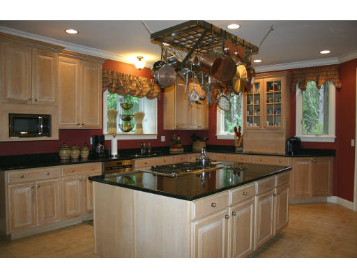 28 Moore Road Sudbury, MA 01776 - Photo 7 of 21 a kitchen with a sink and cabinets