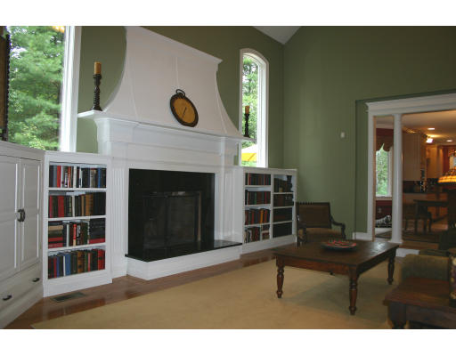 28 Moore Road Sudbury, MA 01776 - Photo 10 of 21 a living room with furniture and a fireplace