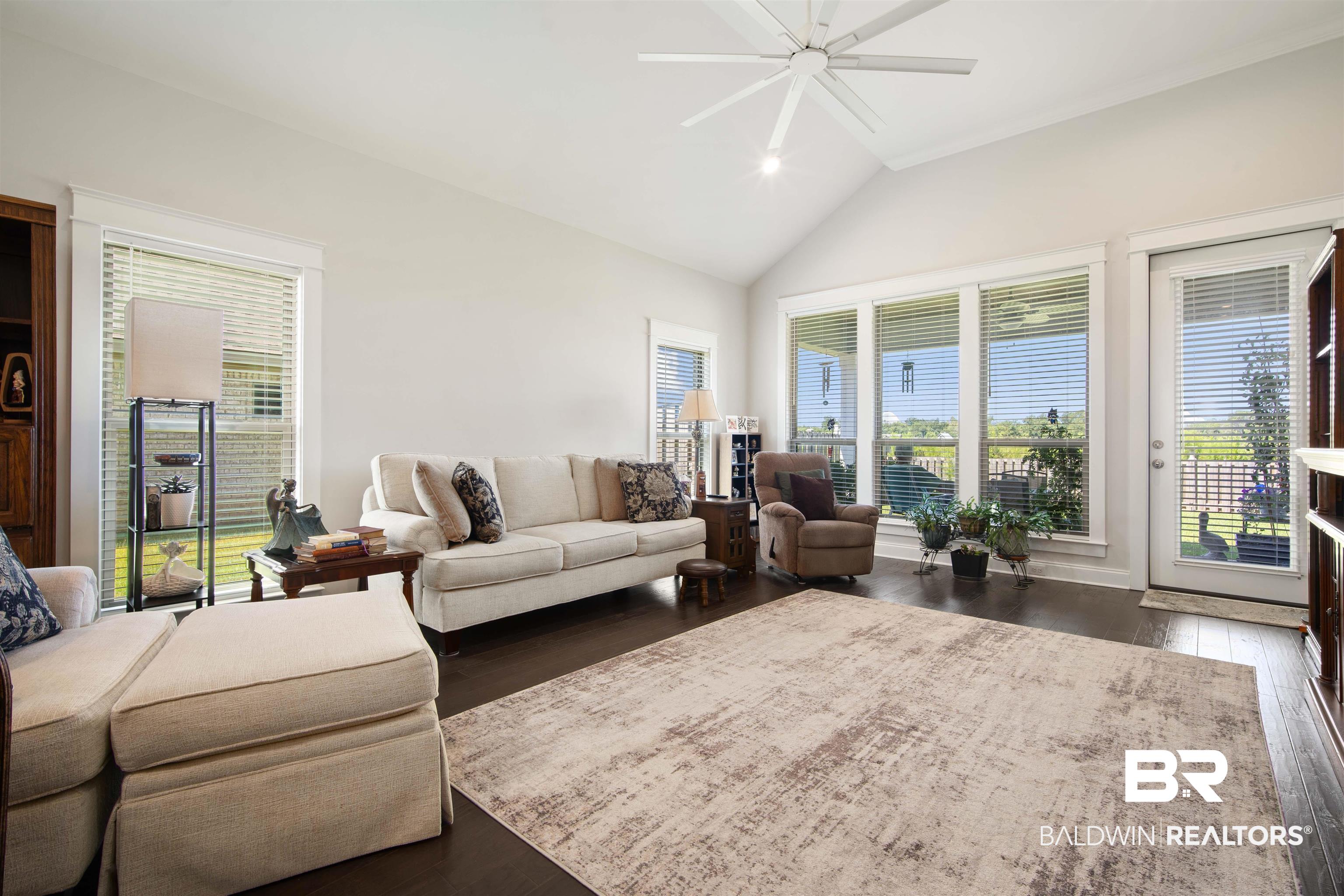 969 Charleston Loop Fairhope, AL 36532 - Photo 4 of 30 Living room featuring high vaulted ceiling, ceiling fan, and hardwood / wood-style floors