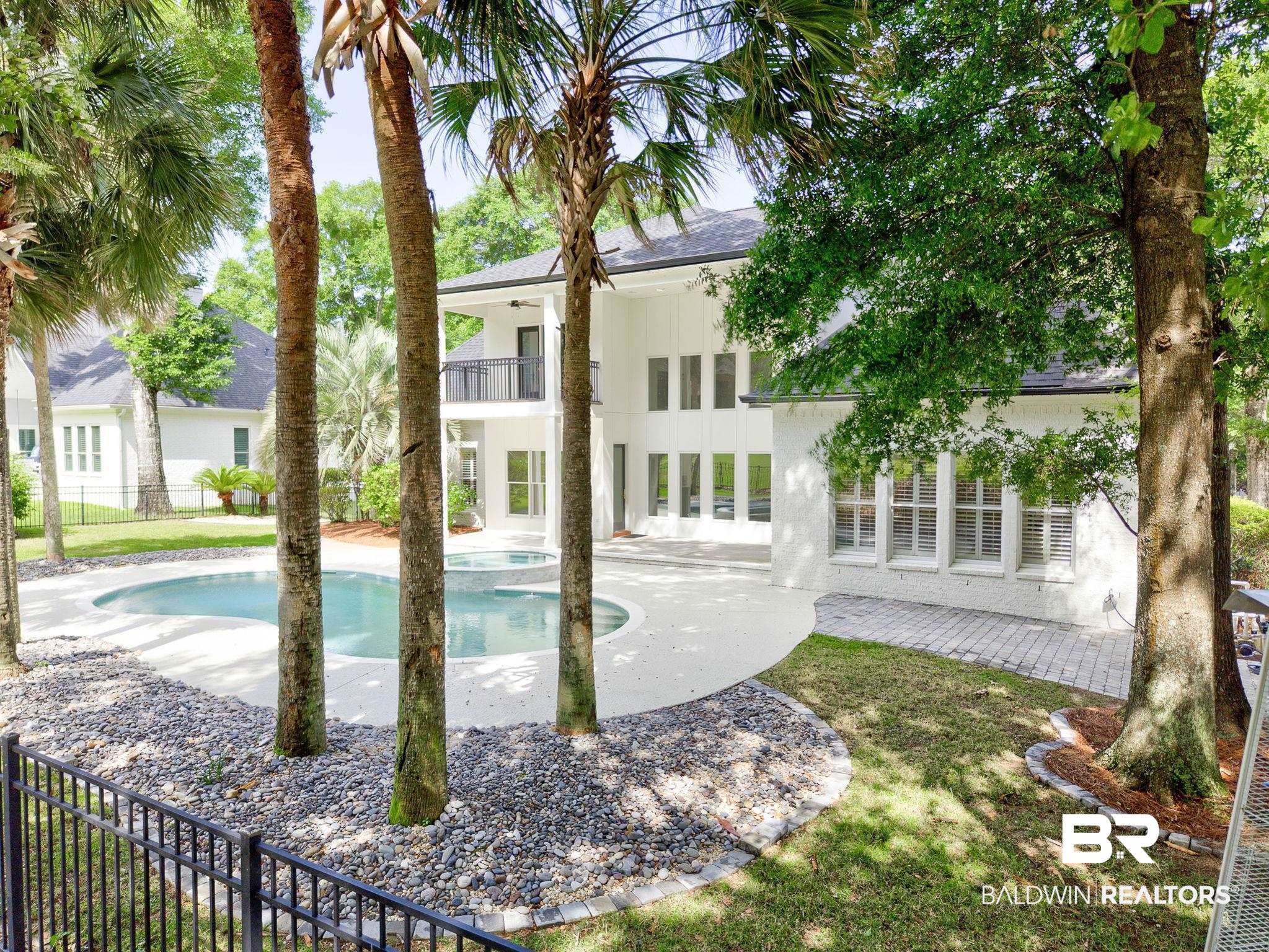 105 High Pines Ridge Fairhope, AL 36532 - Photo 93 of 97 Outdoor pool with fence and a patio area