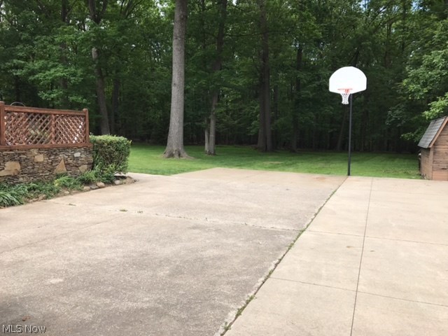 5807 East Sprague Road Independence, OH 44131 - Photo 31 of 33 Newer concrete driveway to the street, plenty of space for parking and of course a basketball game