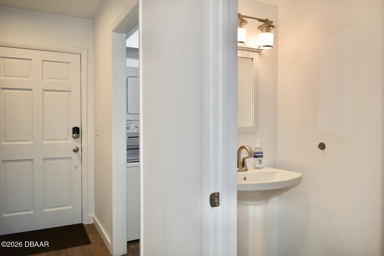 4790 South Atlantic Avenue, Unit F602 Ponce Inlet, FL 32127 - Photo 11 of 23 a bathroom with a sink and a mirror