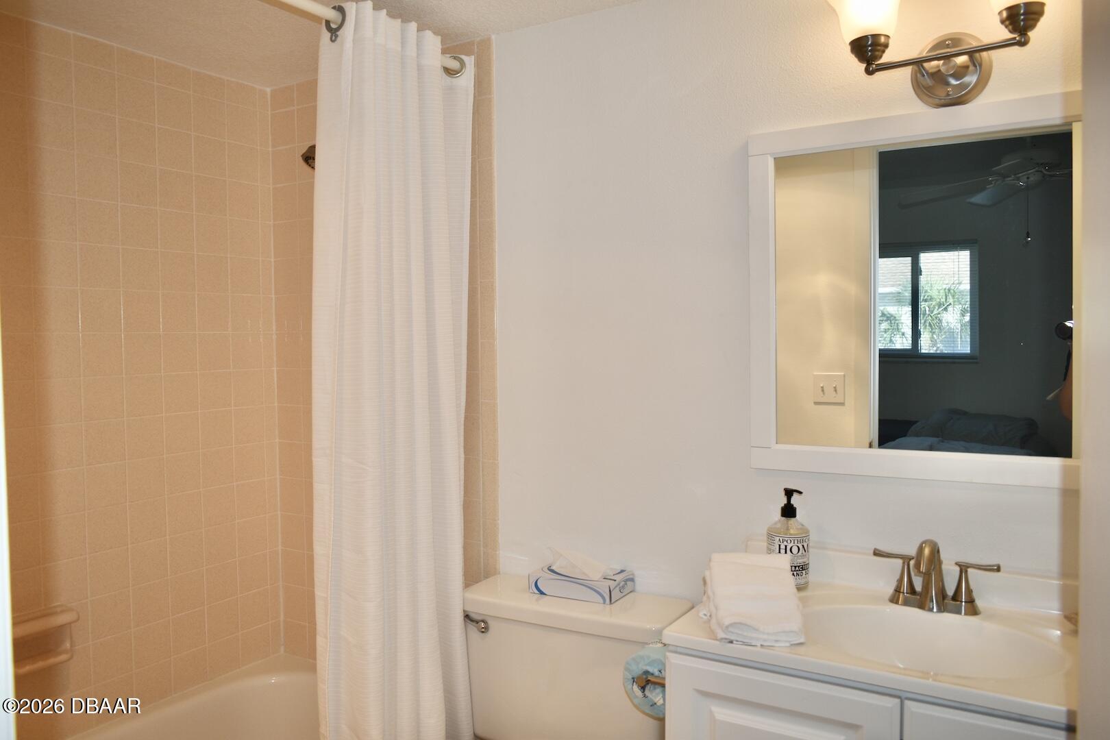4790 South Atlantic Avenue, Unit F602 Ponce Inlet, FL 32127 - Photo 14 of 23 a bathroom with a sink and a mirror