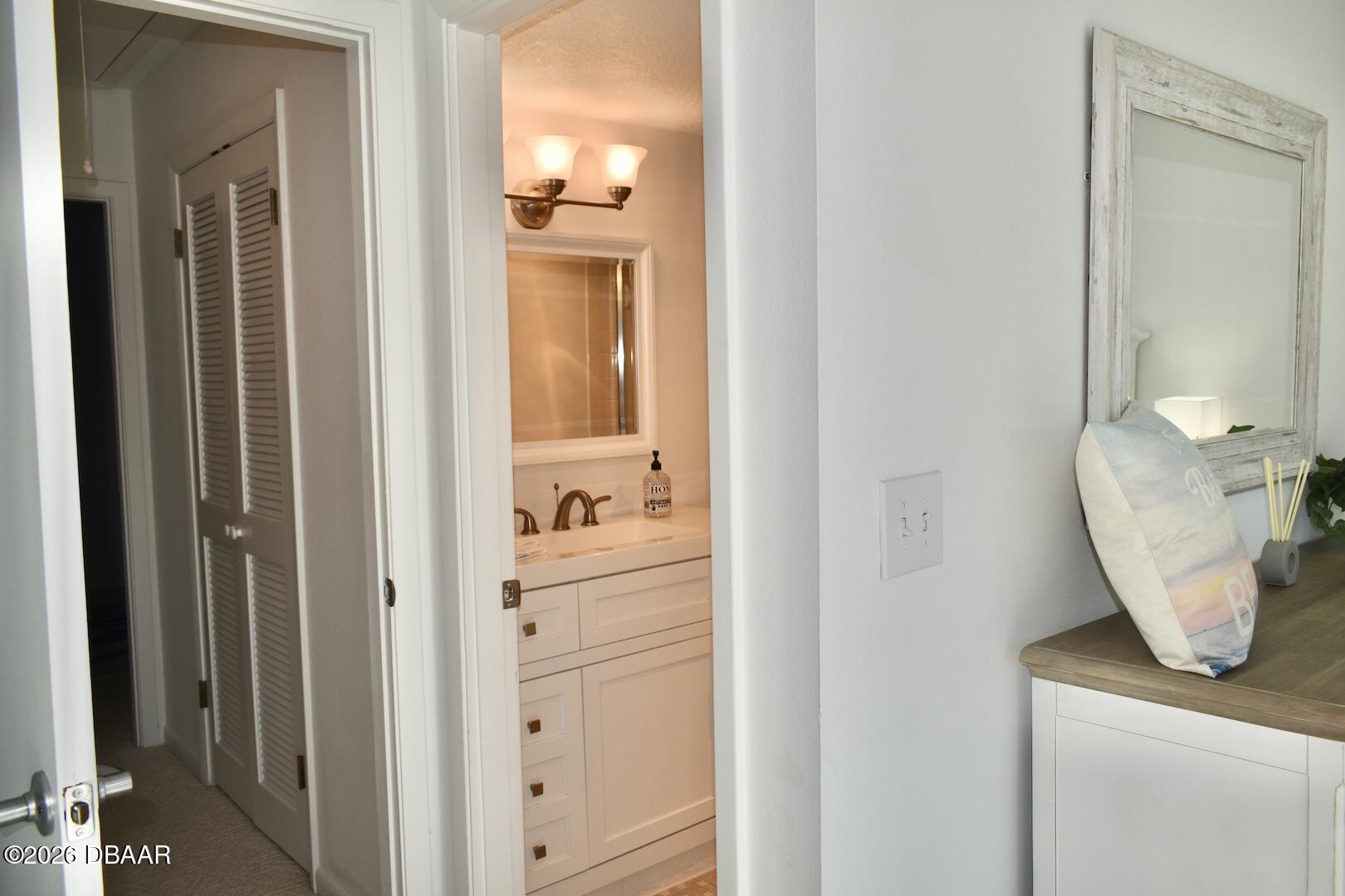 4790 South Atlantic Avenue, Unit F602 Ponce Inlet, FL 32127 - Photo 19 of 23 a room with a door