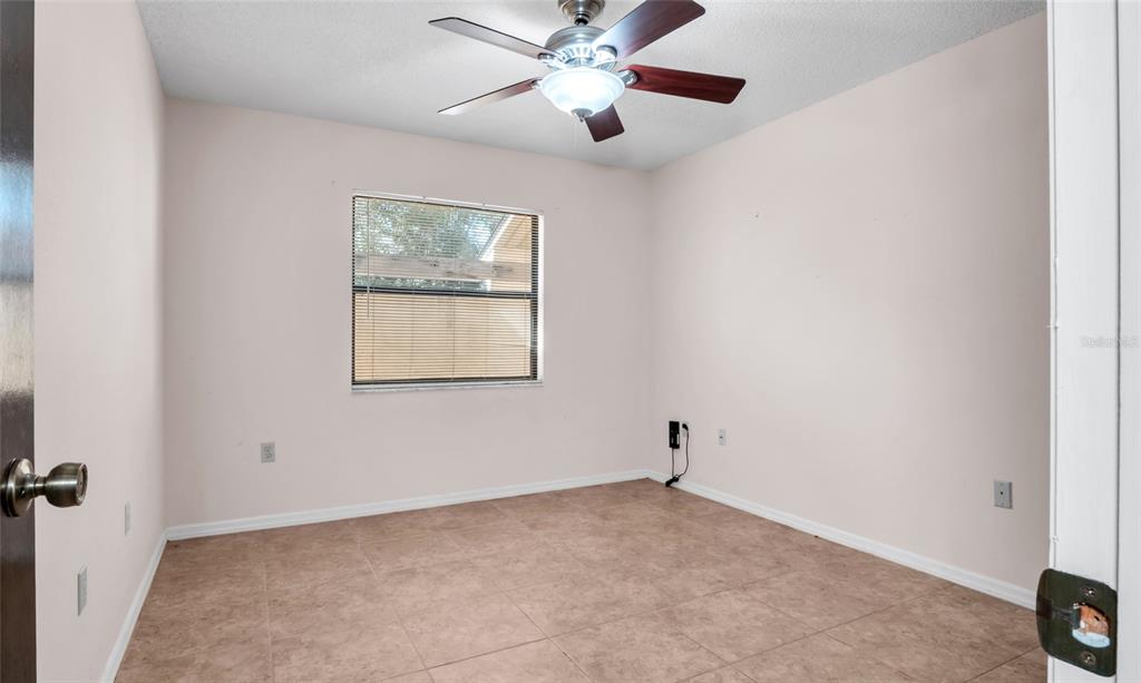 10960 Echo Loop New Port Richey, FL 34654 - Photo 13 of 38 a view of an empty room with a window