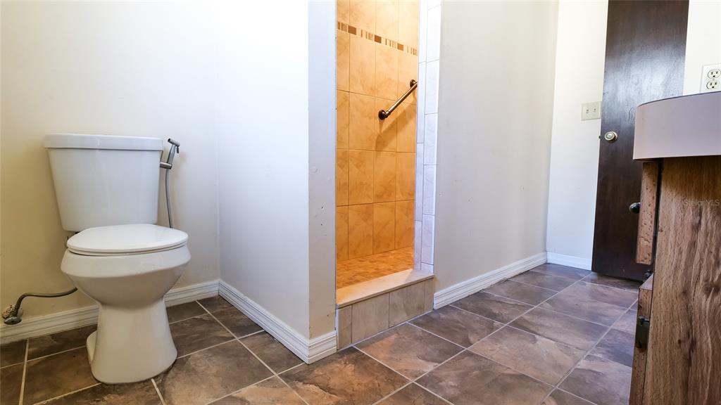 10960 Echo Loop New Port Richey, FL 34654 - Photo 15 of 38 a bathroom with a sink and a toilet