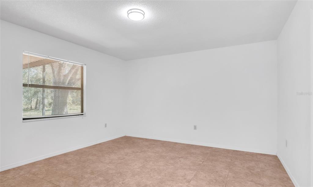 10960 Echo Loop New Port Richey, FL 34654 - Photo 23 of 38 an empty room with a window