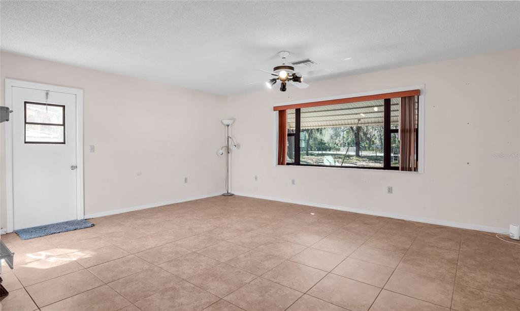 10960 Echo Loop New Port Richey, FL 34654 - Photo 4 of 38 a view of an empty room with a window
