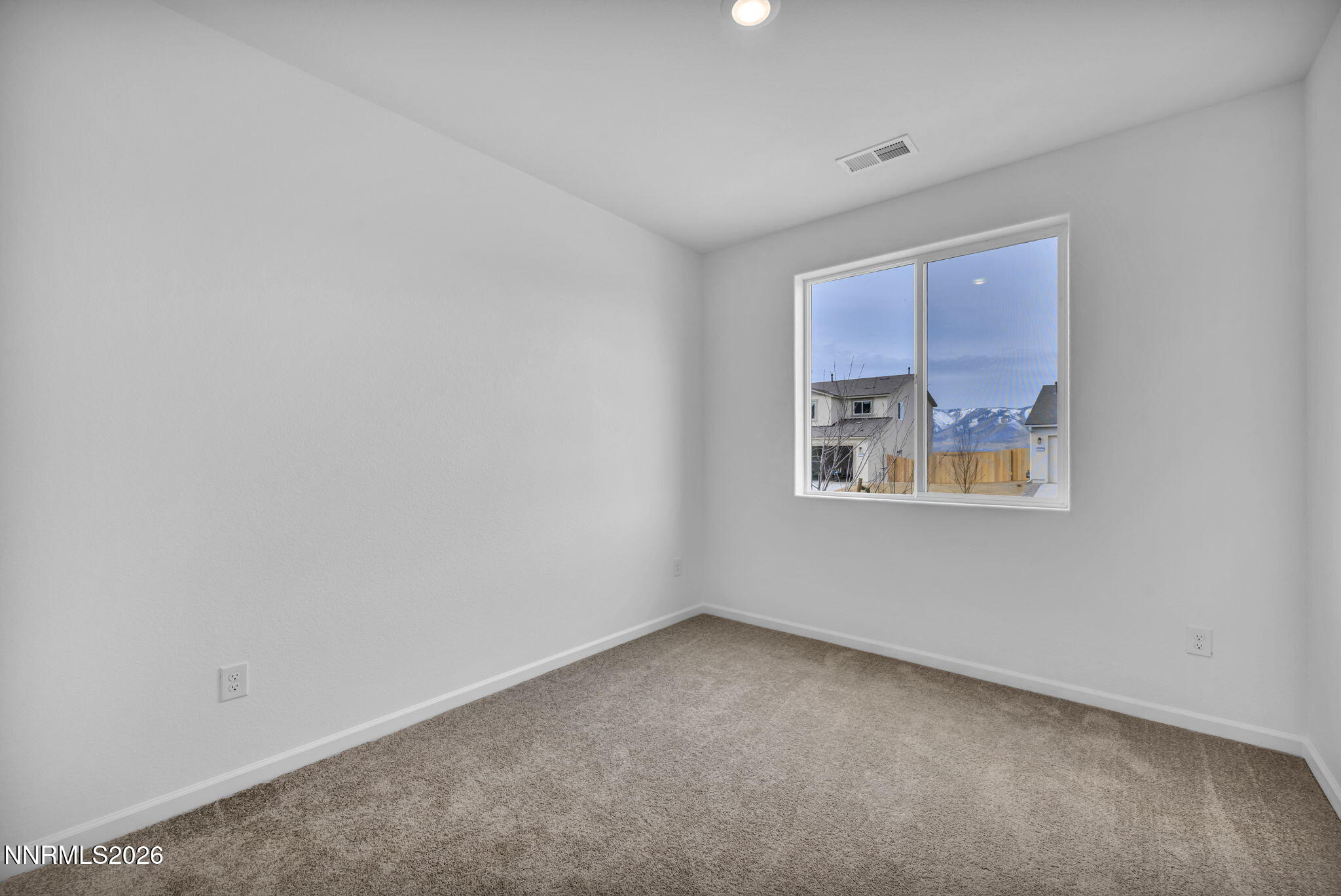 6663 Morgan Mill Road, Unit HOMESITE 44 Carson City, NV 89701 - Photo 12 of 26 a view of an empty room with a window