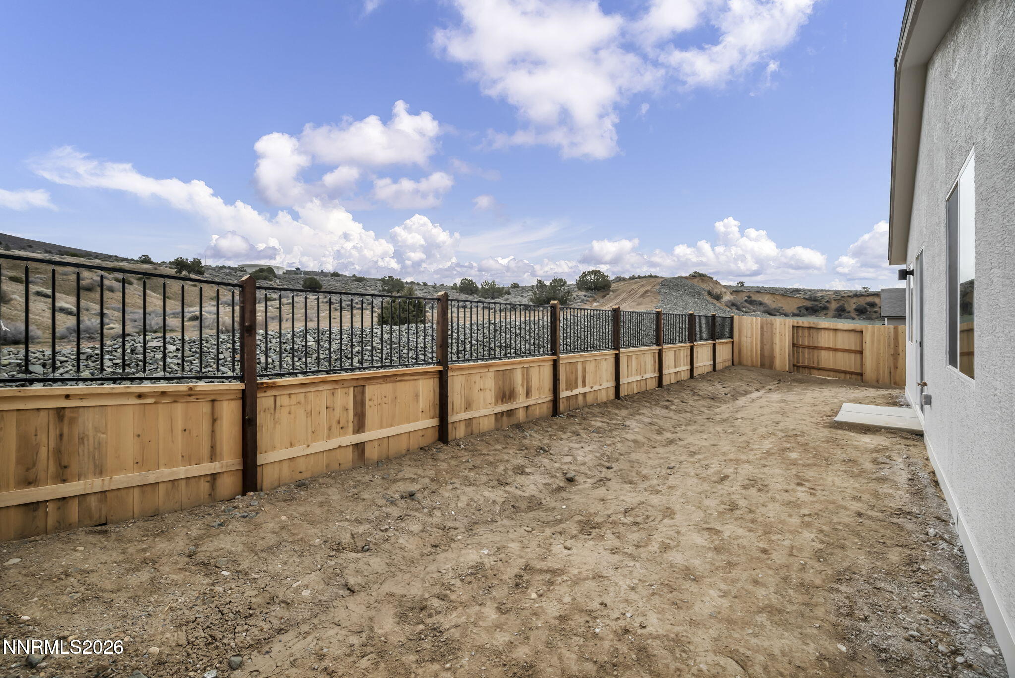 6663 Morgan Mill Road, Unit HOMESITE 44 Carson City, NV 89701 - Photo 21 of 26 a view of outdoor space with iron fence