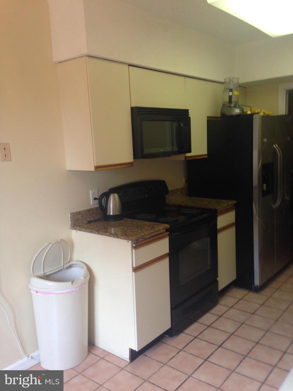 5505 Seminary Road, Unit 1701N Falls Church, VA 22041 - Photo 5 of 20 a kitchen with a sink and a refrigerator
