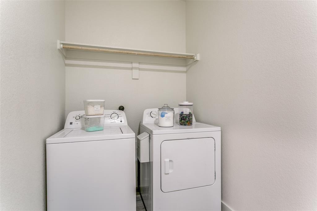 1108 South Morris Street Gainesville, TX 76240 - Photo 21 of 23 a utility room with dryer and washer