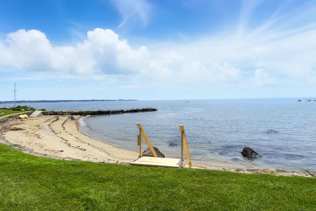 a view of a swimming pool with an ocean view
