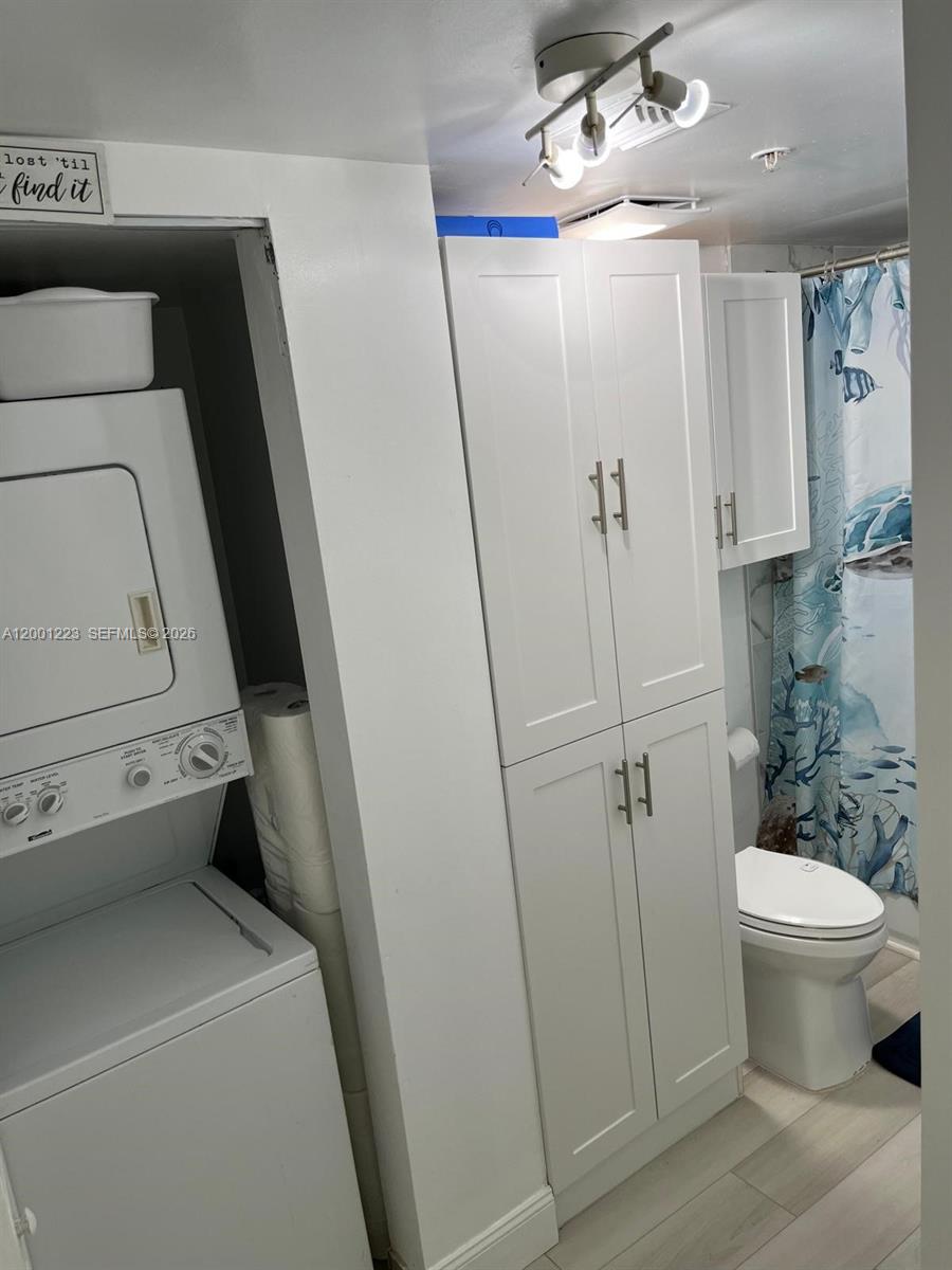 280 Southwest 20th Road, Unit 504 Miami, FL 33129 - Photo 18 of 23 a bathroom with a toilet and a shower