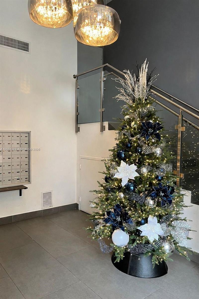 280 Southwest 20th Road, Unit 504 Miami, FL 33129 - Photo 2 of 23 a vase of flowers sitting on a table