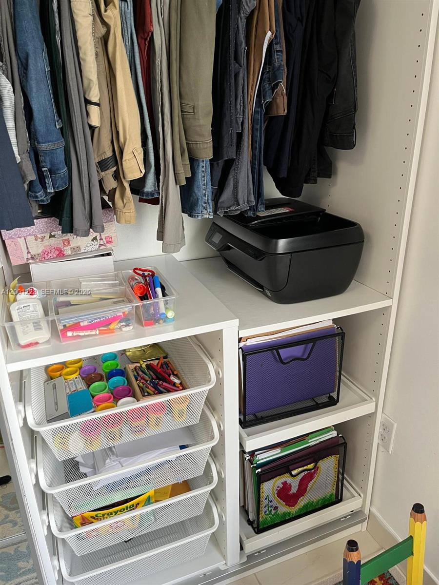 280 Southwest 20th Road, Unit 504 Miami, FL 33129 - Photo 6 of 23 a utility room with dryer and bicycles