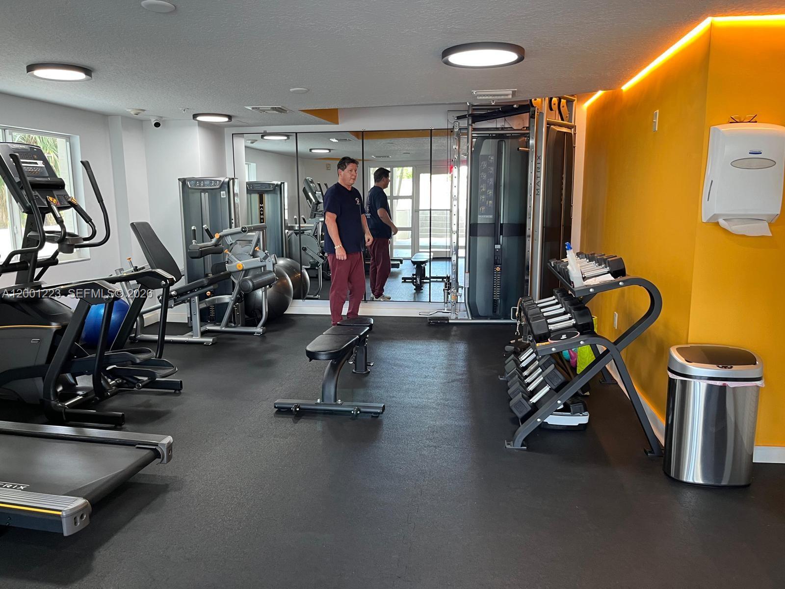 280 Southwest 20th Road, Unit 504 Miami, FL 33129 - Photo 8 of 23 a view of a room with gym equipment