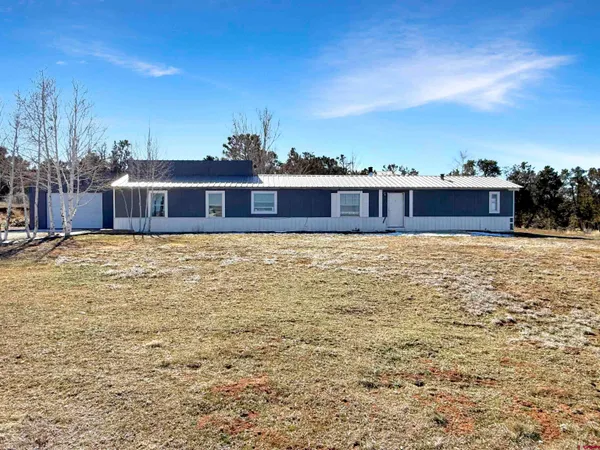 a house view with a outdoor space