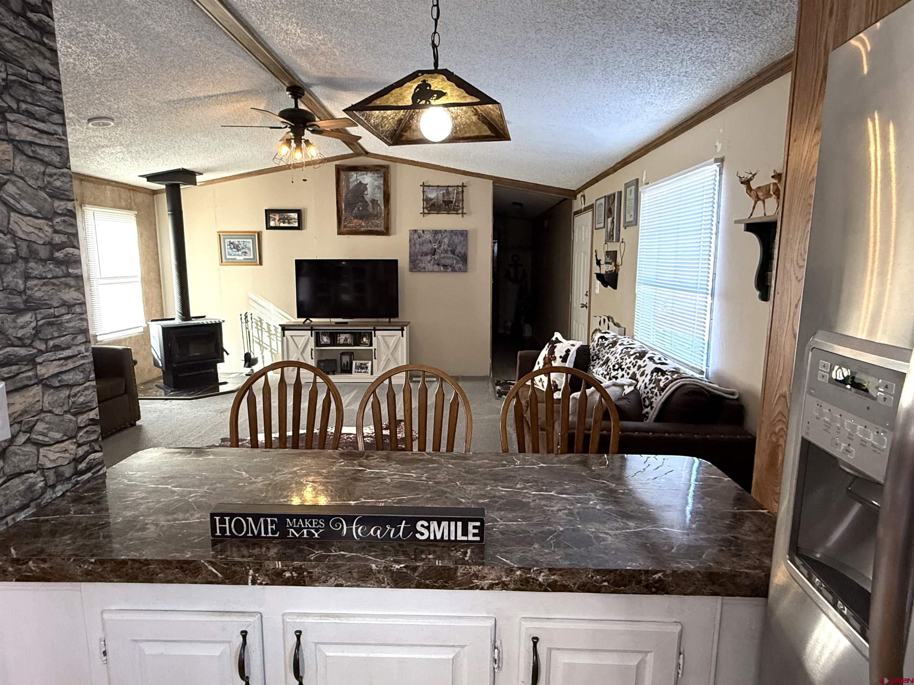 15546 Rd BB Pleasant View, CO 81331 - Photo 7 of 29 a view of kitchen with living room