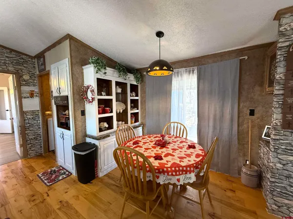 a outdoor space with a table and chairs