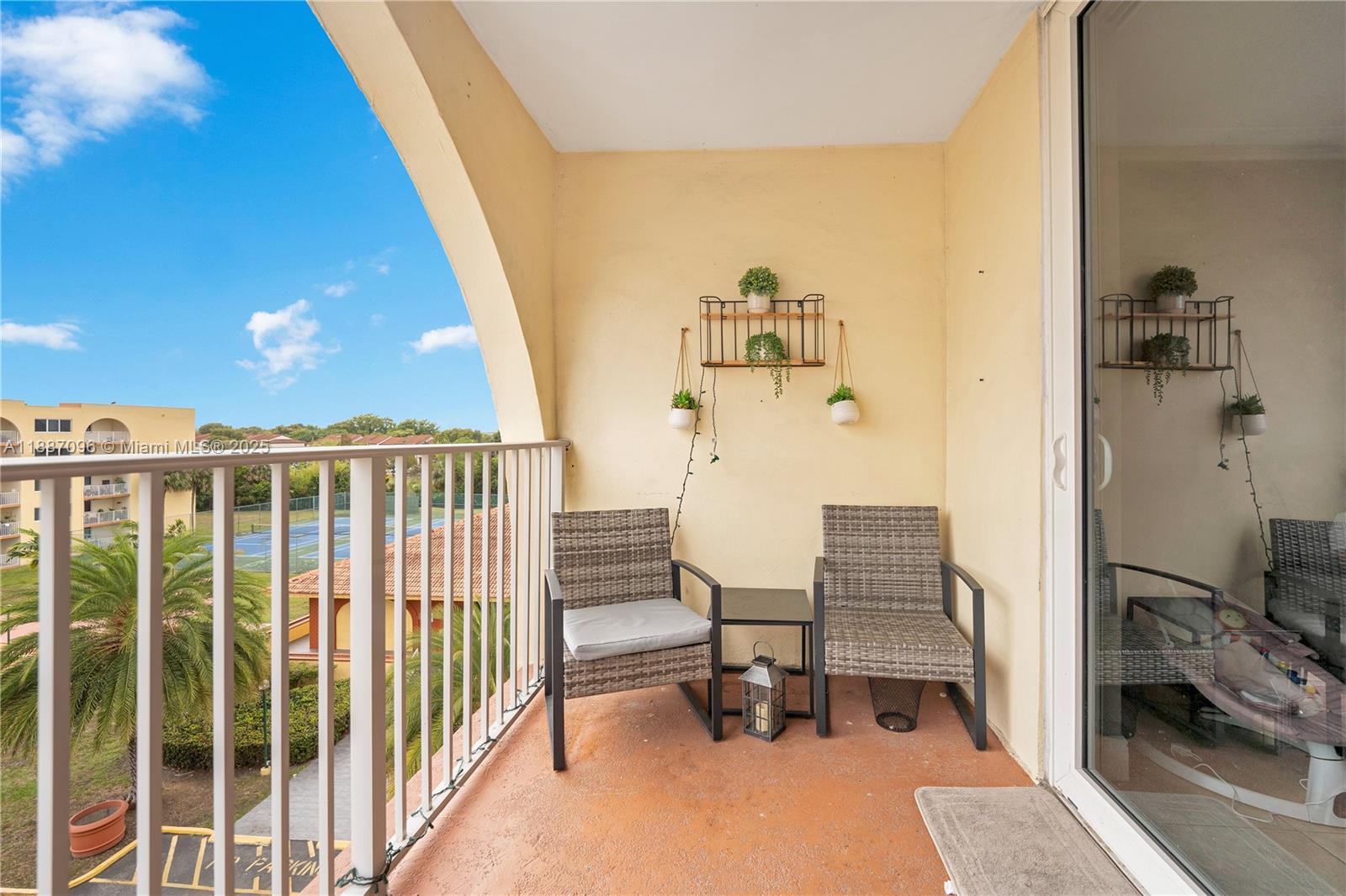 6990 Northwest 186th Street, Unit 4511 Hialeah, FL 33015 - Photo 17 of 29 a view of a hallway with seating area