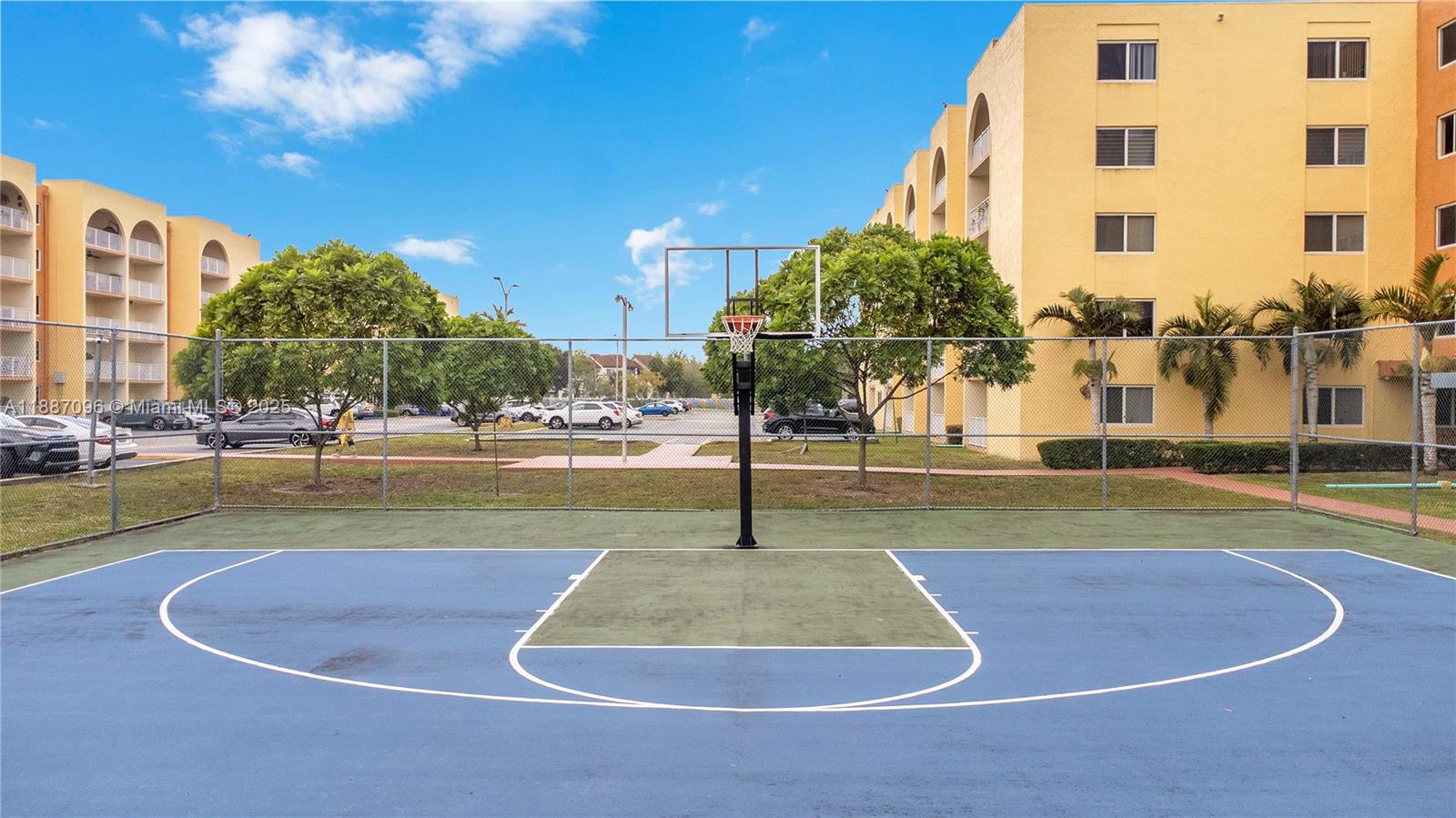 6990 Northwest 186th Street, Unit 4511 Hialeah, FL 33015 - Photo 22 of 29 a view of swimming pool with outdoor seating and plants