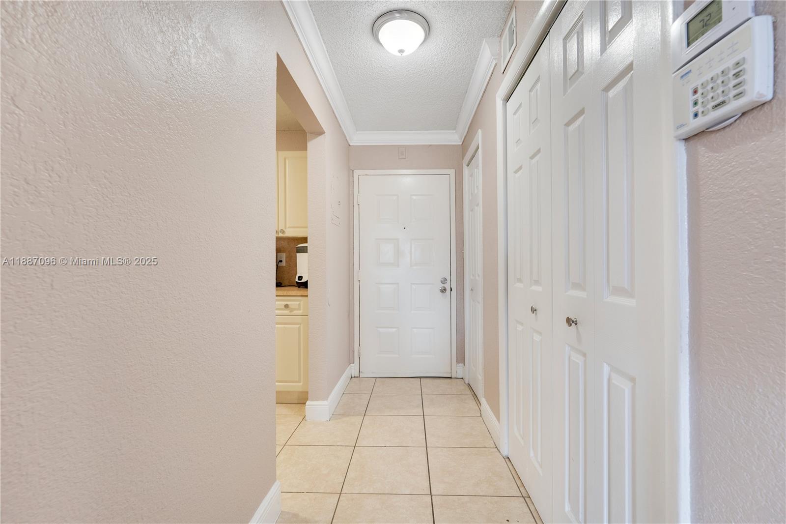 6990 Northwest 186th Street, Unit 4511 Hialeah, FL 33015 - Photo 3 of 29 a view of a hallway
