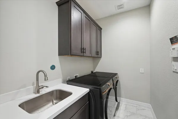 a bathroom with a bathtub shower sink double and mirror