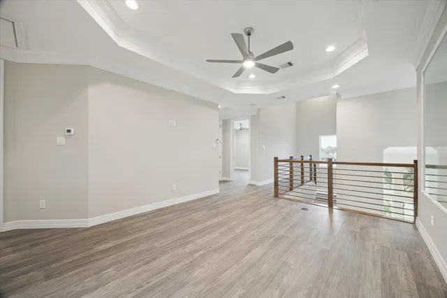 a bathroom with a sink shower and a mirror