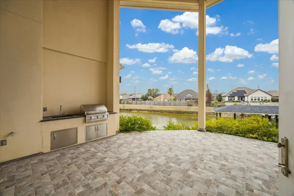 a view of a balcony with lake view and a ocean view