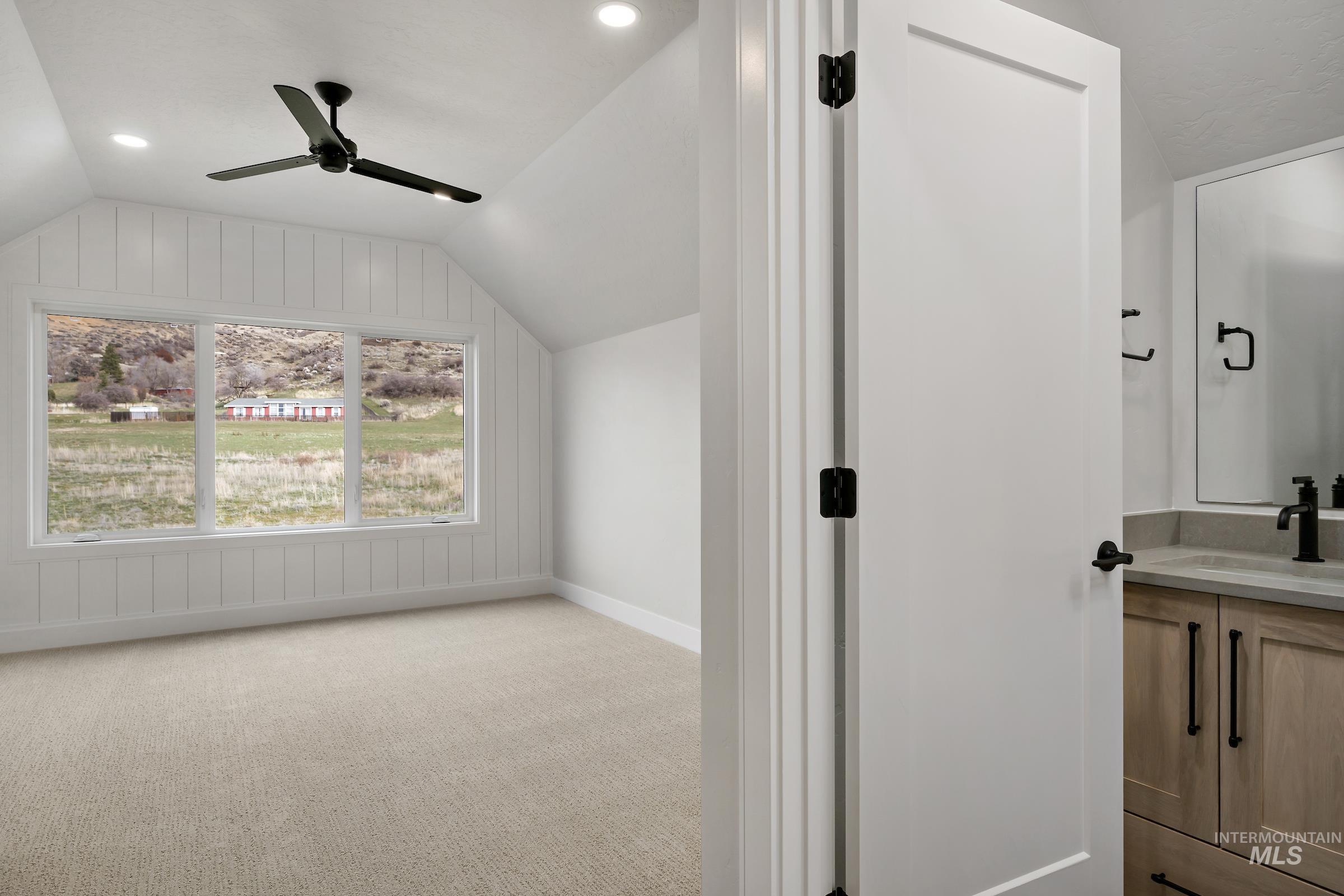 11708 North Rabbitbrush Way Boise, ID 83714 - Photo 28 of 33 Bonus room with lofted ceiling, a ceiling fan, light carpet, and recessed lighting