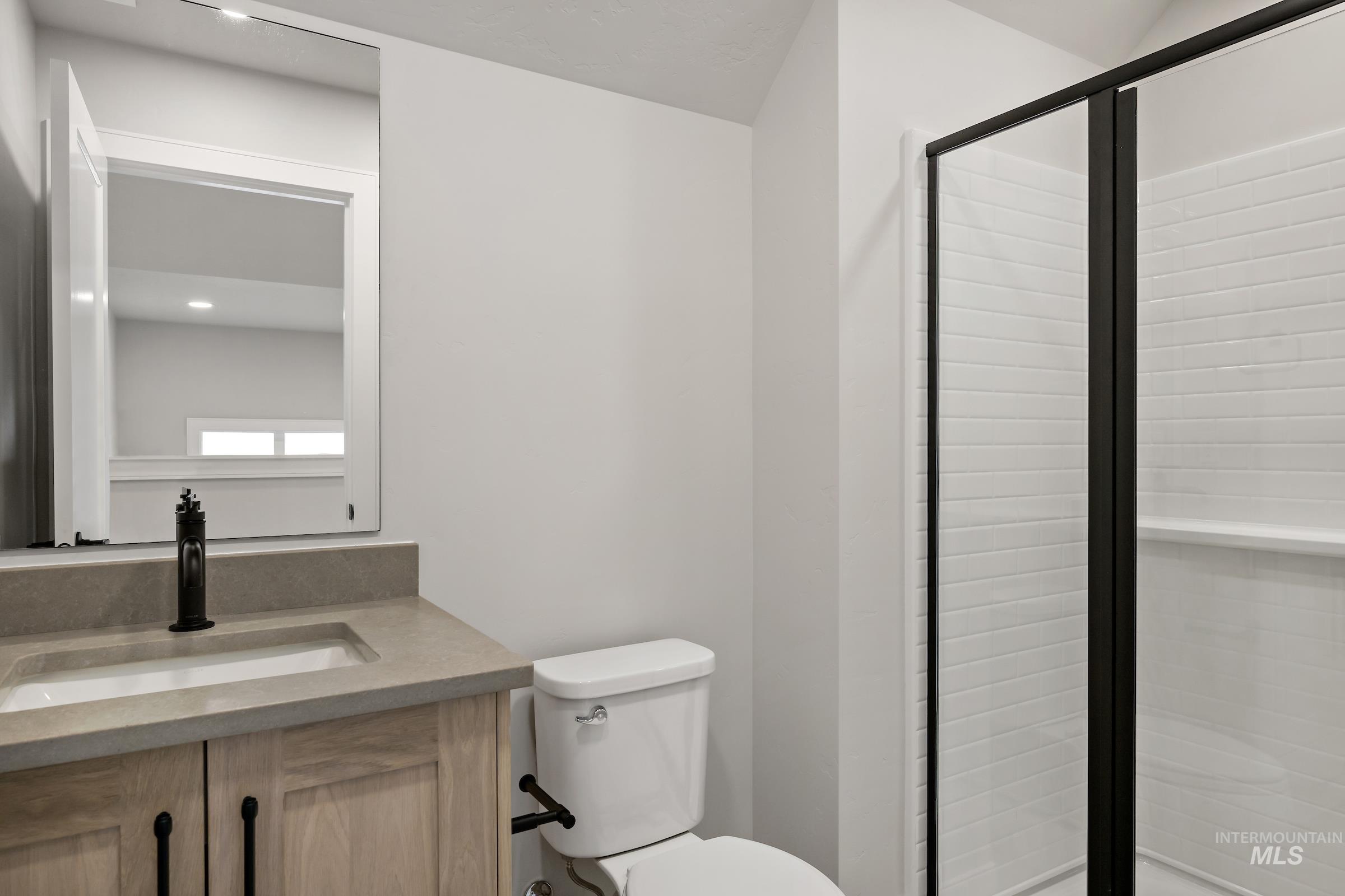 11708 North Rabbitbrush Way Boise, ID 83714 - Photo 31 of 33 Full bath with vanity and a shower stall