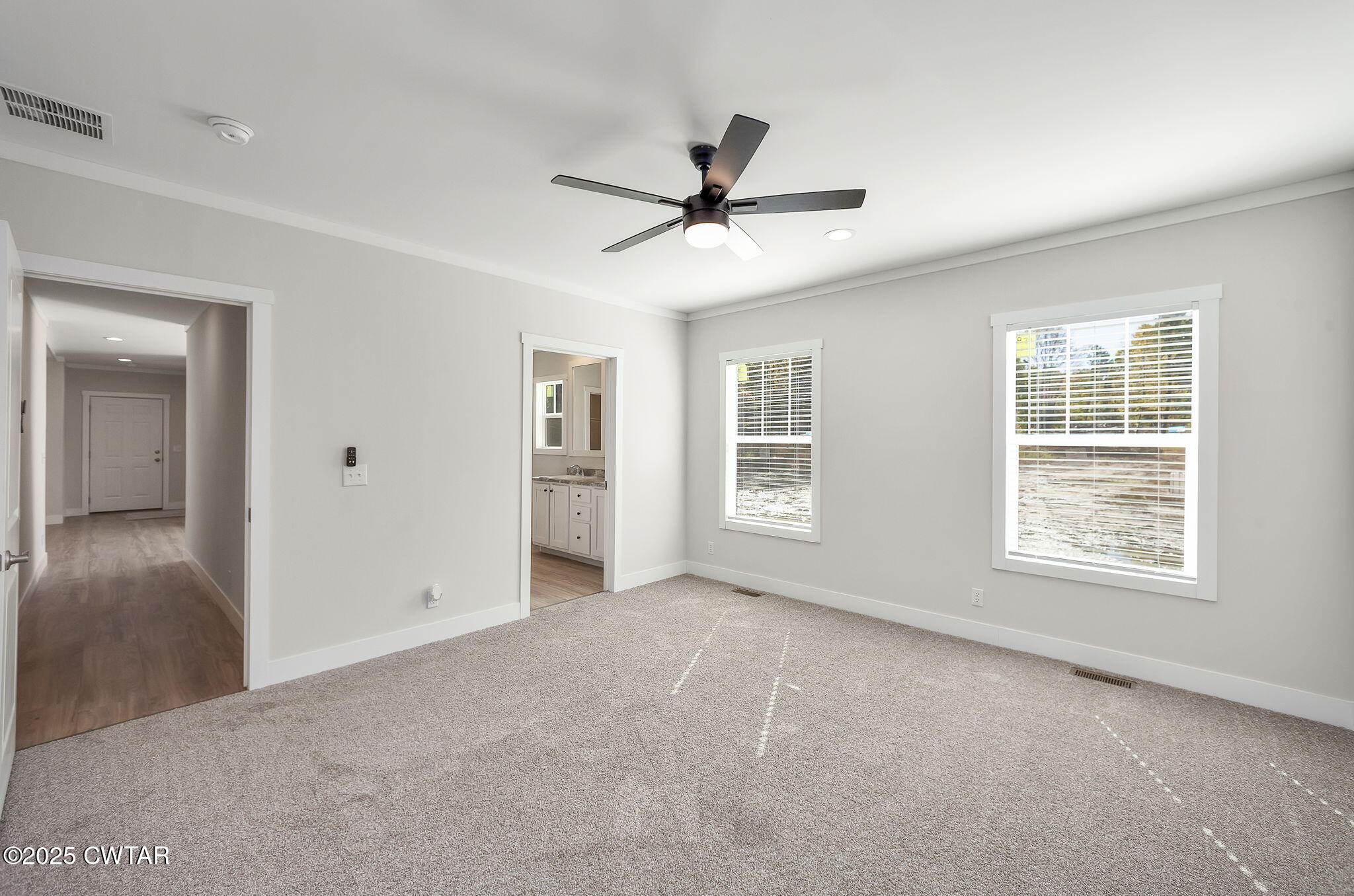2127 North Royal Street Jackson, TN 38305 - Photo 14 of 26 a view of an empty room with a window