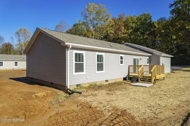 a backyard of a house with seating space