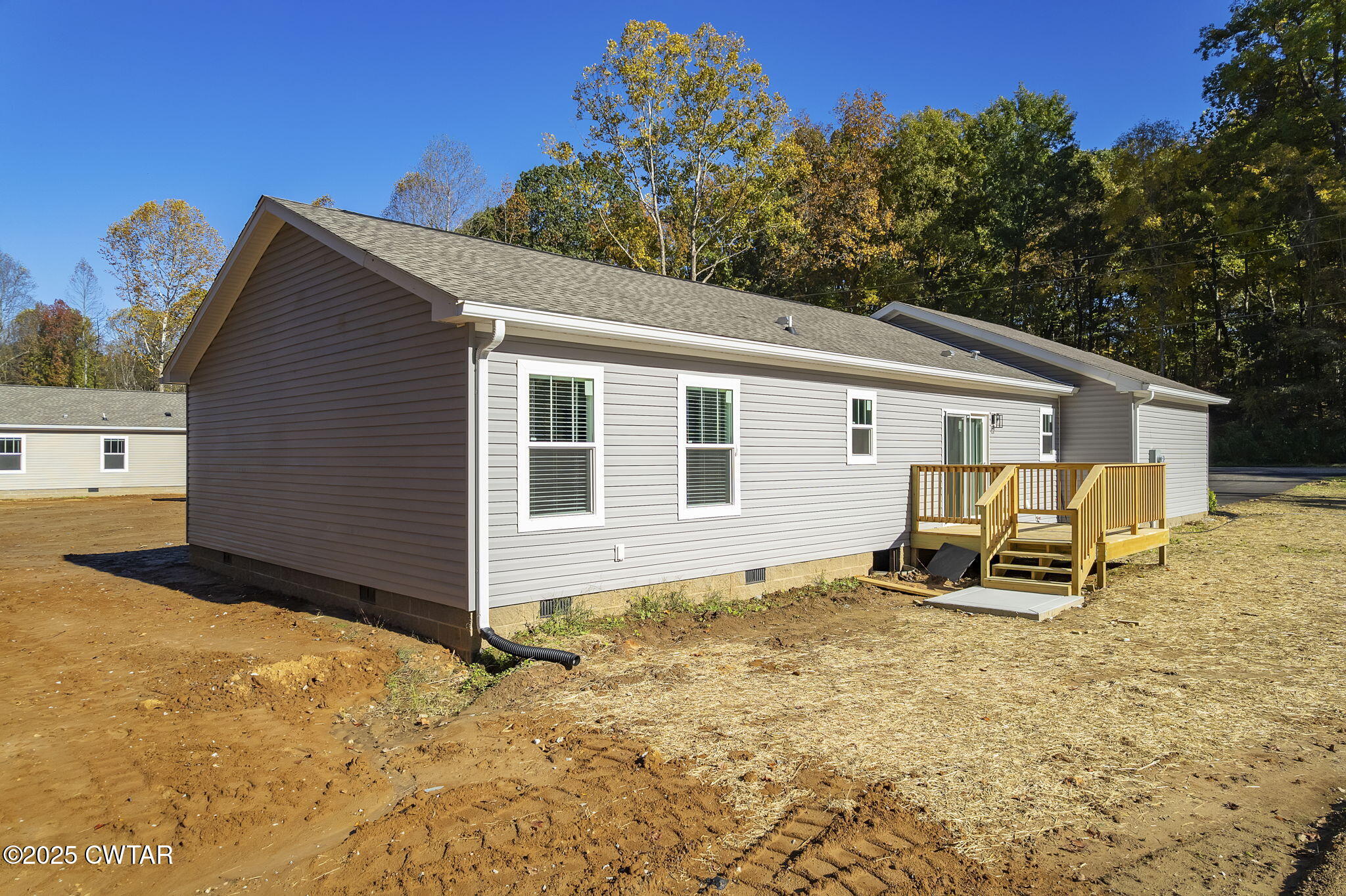 2127 North Royal Street Jackson, TN 38305 - Photo 21 of 26 a backyard of a house with seating space