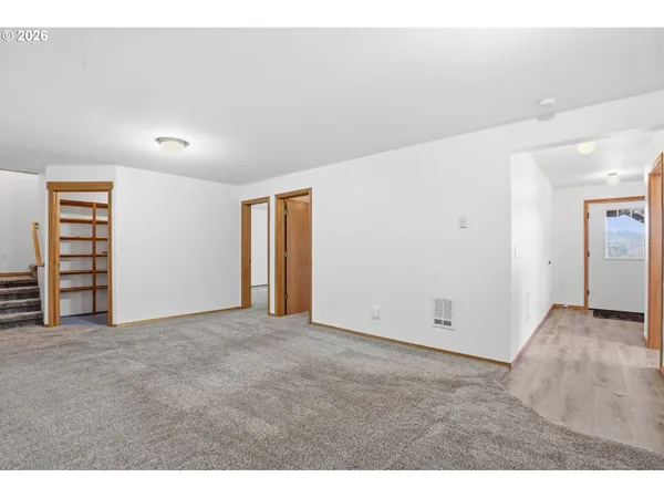 an empty room with window