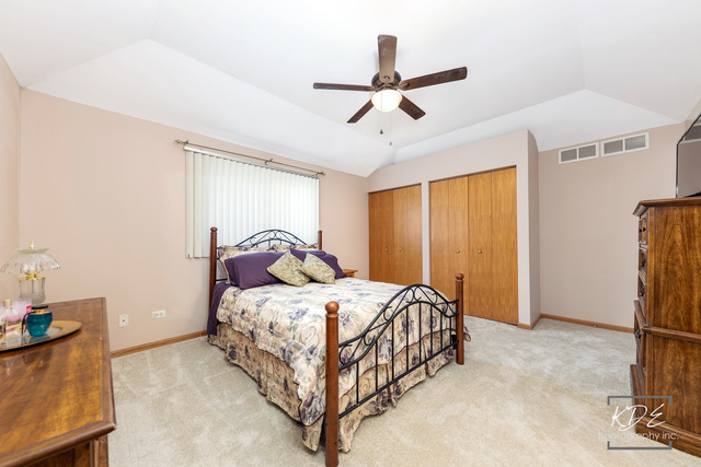 701 Bishops Gate New Lenox, IL 60451 - Photo 14 of 27 a bedroom with a bed and a window