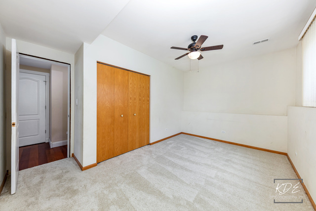 701 Bishops Gate New Lenox, IL 60451 - Photo 18 of 27 wooden floor in an empty room