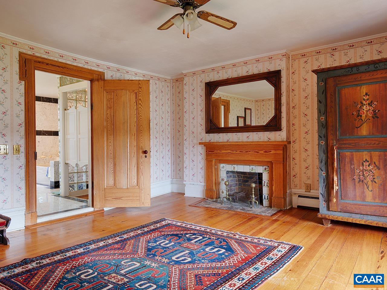 1825 Locust Grove Church Road Orange, VA 22960 - Photo 15 of 68 a living room with a fireplace and next to a window