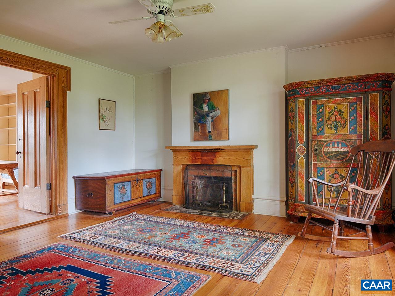 1825 Locust Grove Church Road Orange, VA 22960 - Photo 19 of 68 a living room with furniture and a fireplace