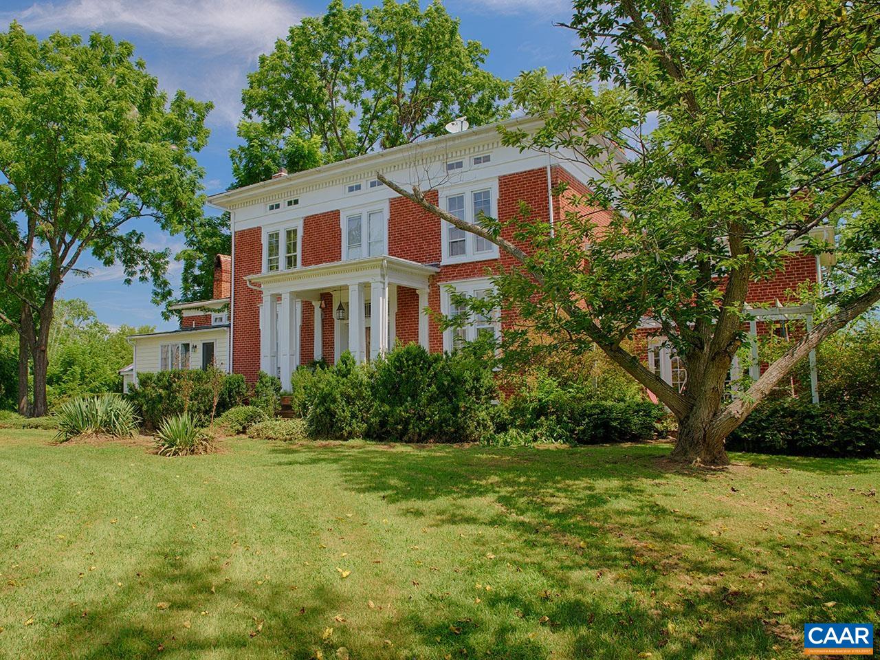 1825 Locust Grove Church Road Orange, VA 22960 - Photo 2 of 68 a front view of a house with garden