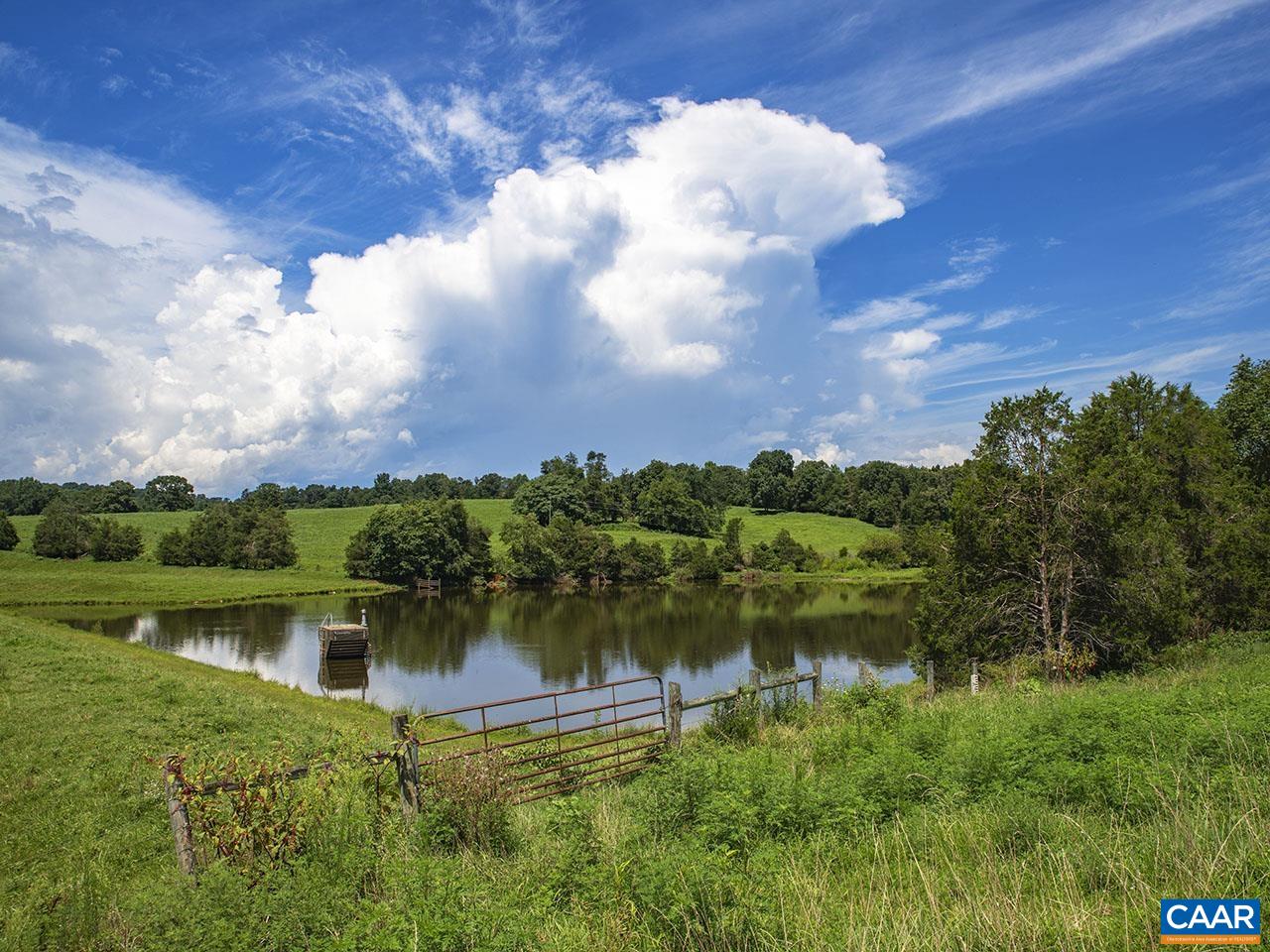1825 Locust Grove Church Road Orange, VA 22960 - Photo 40 of 68 a view of a lake with houses in the back