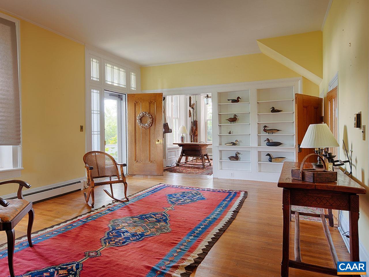 1825 Locust Grove Church Road Orange, VA 22960 - Photo 6 of 68 a bedroom with furniture and a chair