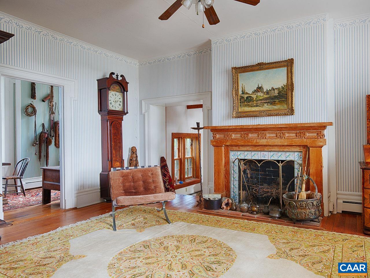 1825 Locust Grove Church Road Orange, VA 22960 - Photo 8 of 68 a living room with furniture and a fireplace