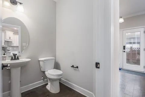 a view of a balcony with wooden floor
