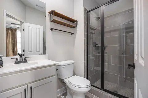 a view of a chairs and table in the patio
