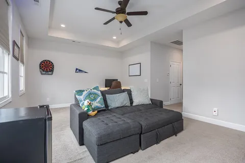 a view of a fountain in front of a house