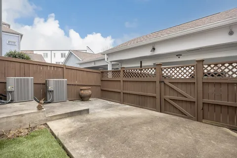 a view of a park with swings and slides